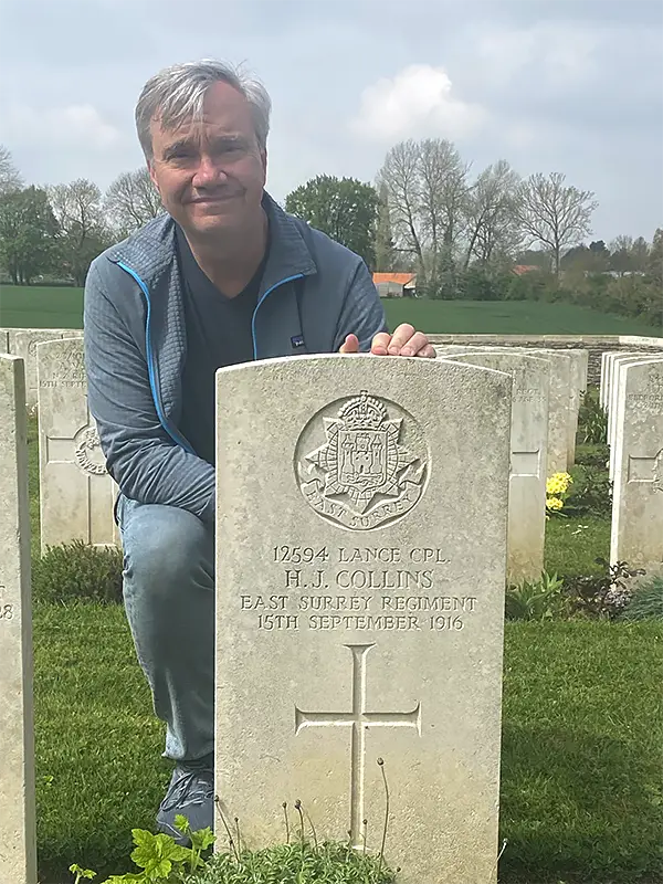 John McCormick with tombstone of H. J. Collins